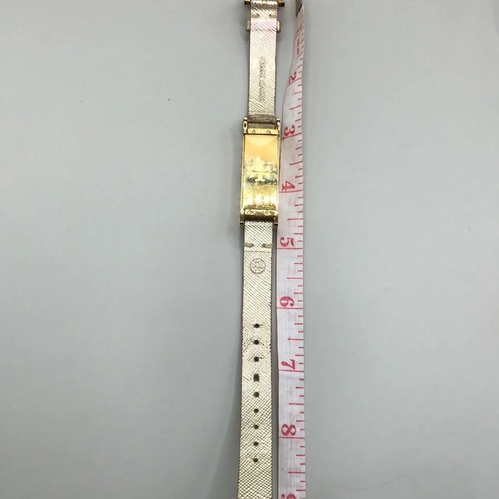 Tory Burch fit bit leather band bracelet.
